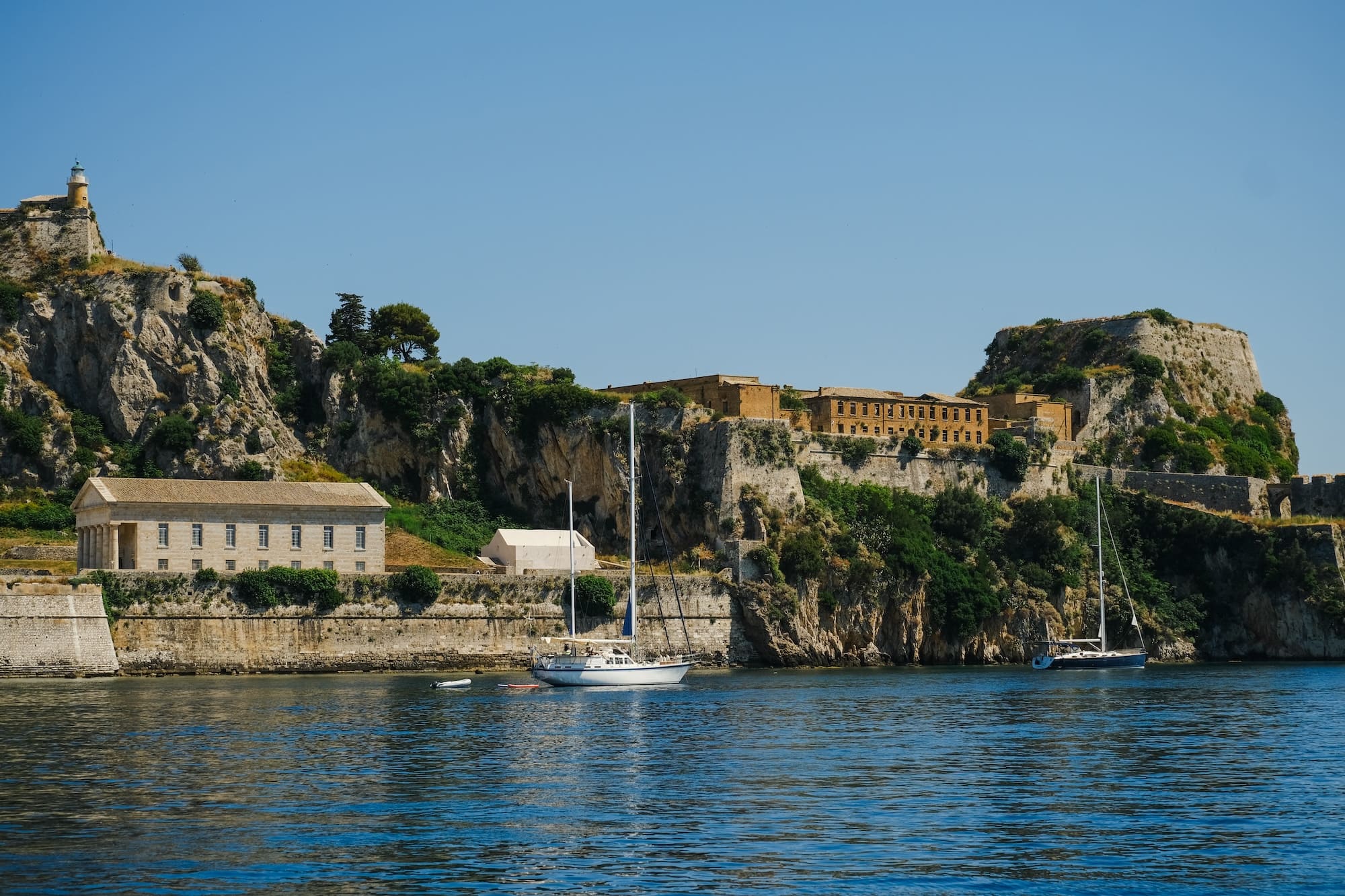 old fortress and sailing boats in corfu old town